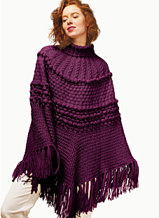 Poncho with bobbles and cables