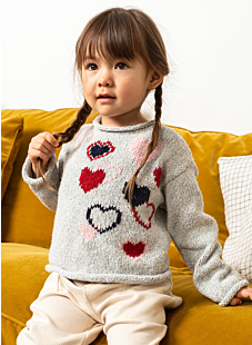 Rolled edge sweater with embroidered hearts