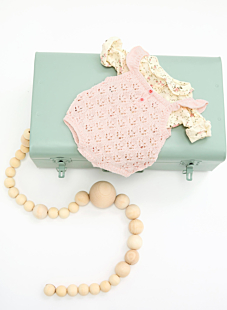 Lace romper suit