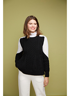 flared cabled sweater